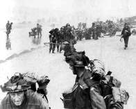 South Lancashire and Middlesex Regiments coming ashore at Sword beach